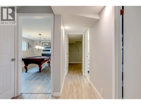 Hall toward Rec Room and suite bedroom at 5723 Richards Crescent, North BX, Vernon