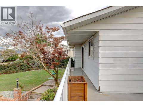 To the walkway through to the dining area at 5723 Richards Crescent, North BX, Vernon