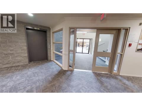 Entrance and elevator at 337 MCKINNEY Road Unit# 107, Oliver