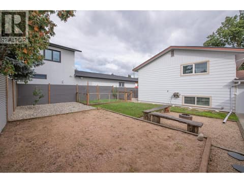Backyard with firepit and garden space at 2855 Burns Avenue, Armstrong/ Spall.