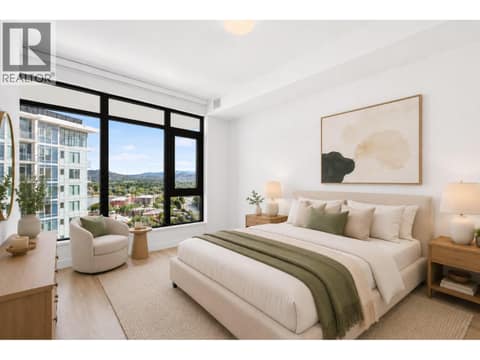 The primary suite features a spa inspired ensuite with dual vanities and a custom walk in closet. *virtually staged at 3699 Capozzi Road Unit# PH6, Lower Mission, Kelowna