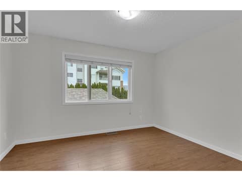 Second bedroom upstairs at 1675 Thayer Court Unit# 3, Glenmore, Kelowna