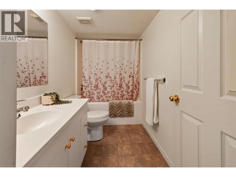 Full bathroom lower at 1380 Loseth Drive, Black Mountain, Kelowna
