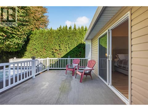 Large doors from primary to the deck and hot tub at 1380 Loseth Drive, Black Mountain, Kelowna