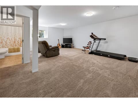 Large rec room with bathroom at 1380 Loseth Drive, Black Mountain, Kelowna