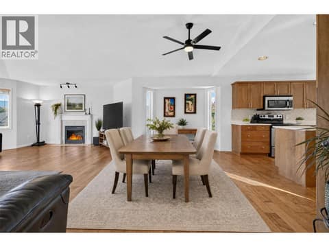 Virtually staged dining area at 1380 Loseth Drive, Black Mountain, Kelowna