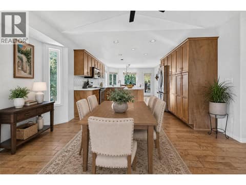 Virtually staged dining area at 1380 Loseth Drive, Black Mountain, Kelowna
