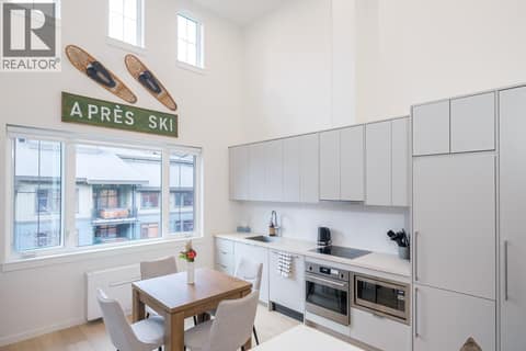 Dining Room / Kitchen at 4280 Red Mountain Road Unit# 405, Rossland
