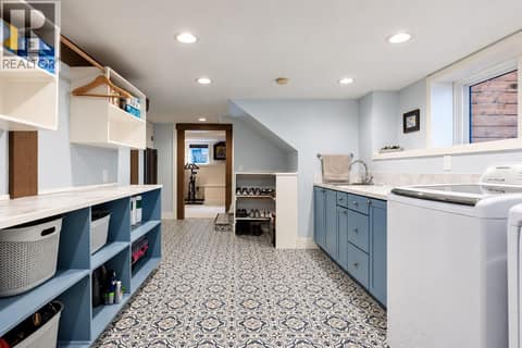 Just off the rec room and right down the stairs. Could also be a suite with some adjustments. at 2071 Abbott Street, Kelowna South