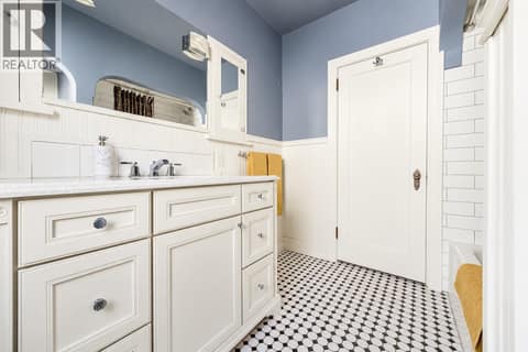 Main floor 4 piece washroom all period correct and new. Tub and shower combo. at 2071 Abbott Street, Kelowna South