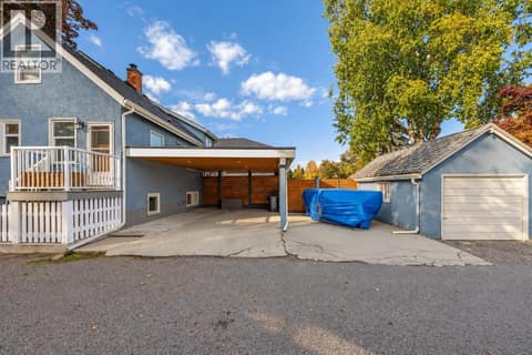 Nice wide carport and a single garage to lock away all that beach equipment and bikes. Room for your trailer to boot! at 2071 Abbott Street, Kelowna South