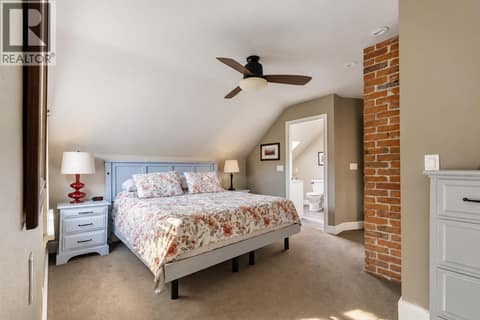 Primary Bedroom on the upper floor. at 2071 Abbott Street, Kelowna South