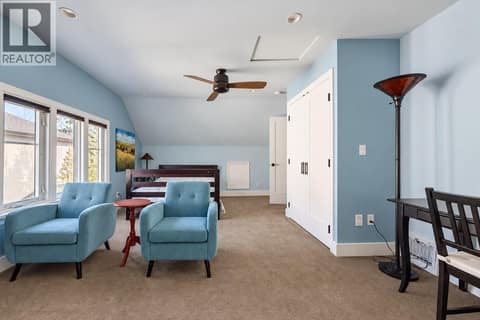Upstairs alternate bedroom makes for a great TV, Reading retreat for the Primary bedroom. Or a younger childs room. at 2071 Abbott Street, Kelowna South