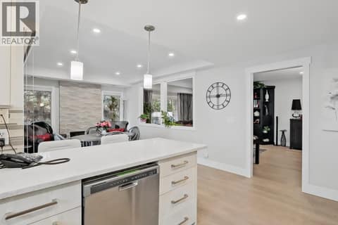 Kitchen with view of Nook, Living/Dining at 3335 Richter Street Unit# 201, Lower Mission, Kelowna