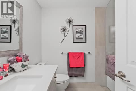 Main Bathroom with custom walk-in shower at 3335 Richter Street Unit# 201, Lower Mission, Kelowna