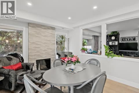 Nook with view of living area from engineered 'pass-through' at 3335 Richter Street Unit# 201, Lower Mission, Kelowna