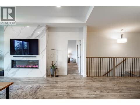 Feature fireplace with quartz tile front at 881 Mt.Ida Drive, Middleton Mountain Vernon