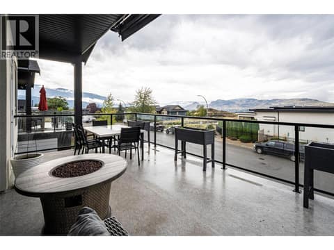 Front covered deck /balcony with glass rail at 881 Mt.Ida Drive, Middleton Mountain Vernon