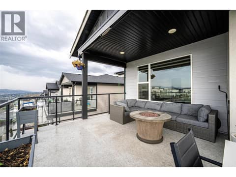 Front partially covered deck with glass railing at 881 Mt.Ida Drive, Middleton Mountain Vernon