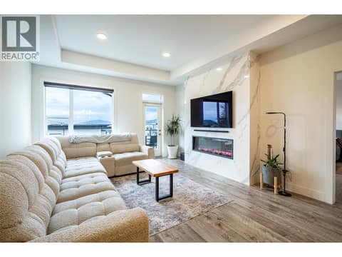 Stylish living room with 9 foot ceilings & amazing views at 881 Mt.Ida Drive, Middleton Mountain Vernon