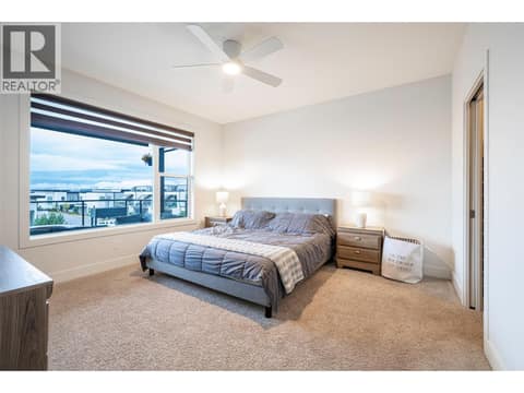 Upper floor - primary bedroom with amazing city & valley & mountain views at 881 Mt.Ida Drive, Middleton Mountain Vernon