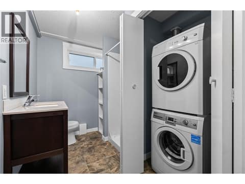 Lower Level - Bathroom with Laundry at 3000 Richter Street Unit# 6, Kelowna South