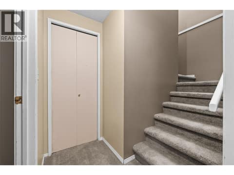 Lower Level - Central Stairwell to Main Level at 3000 Richter Street Unit# 6, Kelowna South