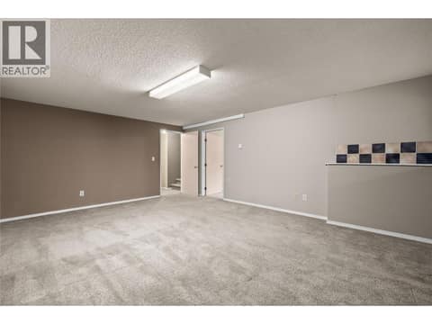 Lower Level - Rec Room - could be a 4th Bedroom at 3000 Richter Street Unit# 6, Kelowna South