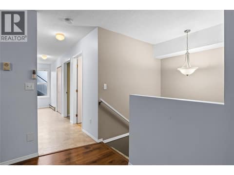 Main Level - Central Staircase to Lower Level at 3000 Richter Street Unit# 6, Kelowna South