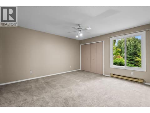 Main Level - King Sized Primary at 3000 Richter Street Unit# 6, Kelowna South