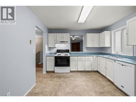 Main Level - Kitchen with Pass-Thru at 3000 Richter Street Unit# 6, Kelowna South