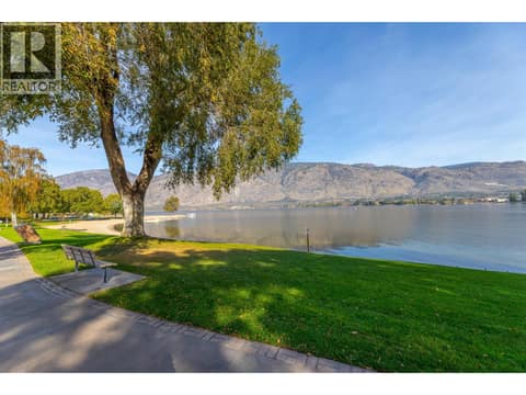 Mature trees and green space beside the lake. at 15 PARK Place Unit# 209, Osoyoos