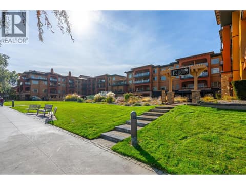 Waterfront path, lawn and resort buildings. at 15 PARK Place Unit# 209, Osoyoos