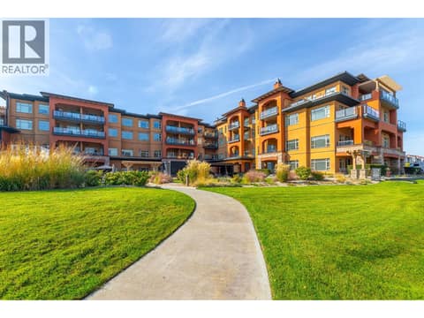 Watermark Beach Resort exterior from the landscaped lakefront grounds. at 15 PARK Place Unit# 209, Osoyoos