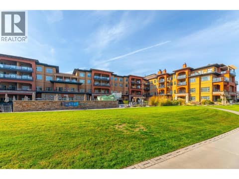 Watermark Beach Resort overlooking the landscaped lakefront lawn. at 15 PARK Place Unit# 209, Osoyoos