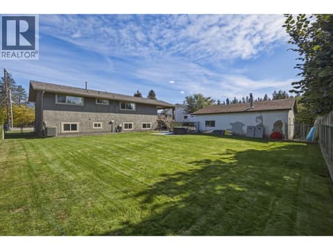 Backyard fully fenced for kids to play safely. at 620 Ziprick Road, Rutland South, Kelowna