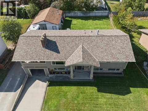 Huge yard with privacy, parking, and play area for kids. at 620 Ziprick Road, Rutland South, Kelowna