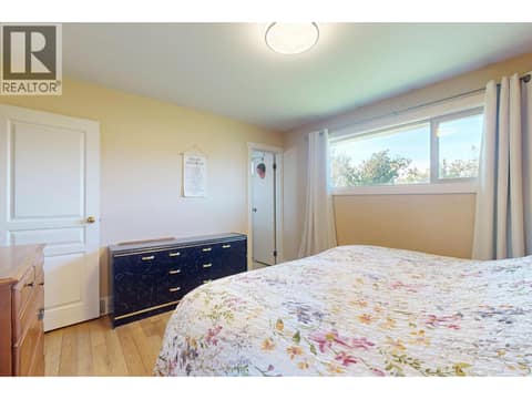 Large master bedroom. at 620 Ziprick Road, Rutland South, Kelowna