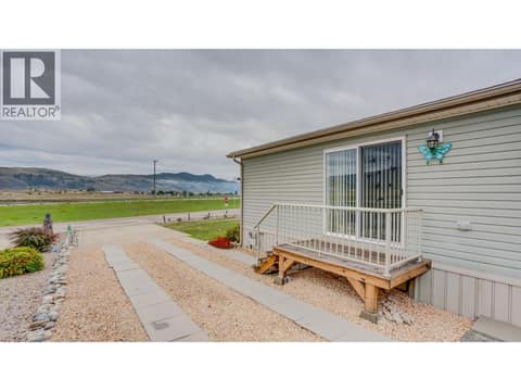Back parking with access to dining room at 12560 Westside Road Unit# 15, Swan Lake West, Vernon
