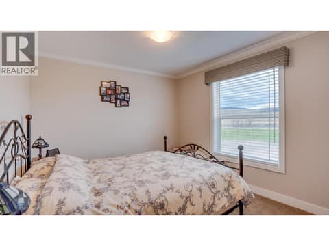 Bedroom 3 with view at 12560 Westside Road Unit# 15, Swan Lake West, Vernon