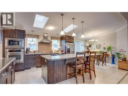 Island Kitchen & Dining at 12560 Westside Road Unit# 15, Swan Lake West, Vernon