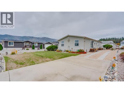 Rear entrance with spacious driveway at 12560 Westside Road Unit# 15, Swan Lake West, Vernon