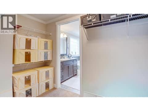 Walk through closet and ensuite at 12560 Westside Road Unit# 15, Swan Lake West, Vernon