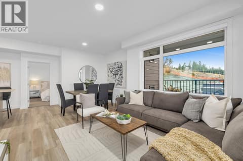 Dining & Living Room. Photos may be of a similar home in the community. at 1057 Frost Road Unit# 301, Upper Mission, Kelowna