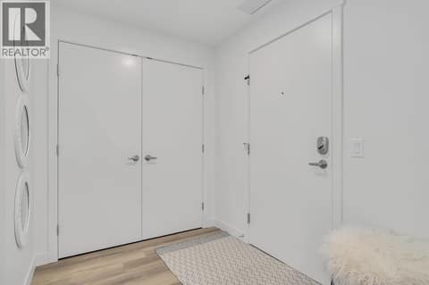 Foyer. Photos may be of a similar home in the community. at 1057 Frost Road Unit# 301, Upper Mission, Kelowna