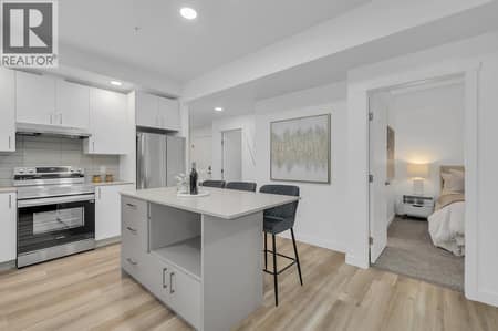 Kitchen. Photos may be of a similar home in the community. at 1057 Frost Road Unit# 301, Upper Mission, Kelowna