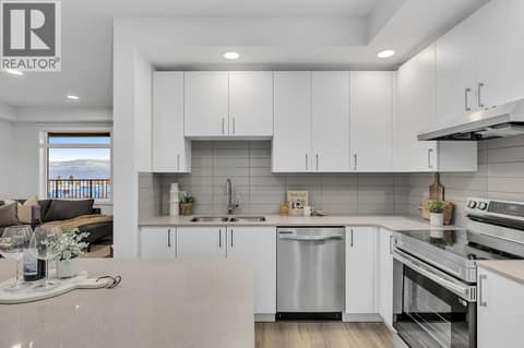 Kitchen. Photos may be of a similar home in the community. at 1057 Frost Road Unit# 301, Upper Mission, Kelowna