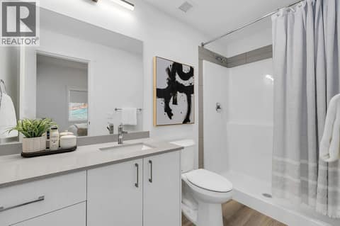 Primary Ensuite. Photos may be of a similar home in the community. at 1057 Frost Road Unit# 301, Upper Mission, Kelowna