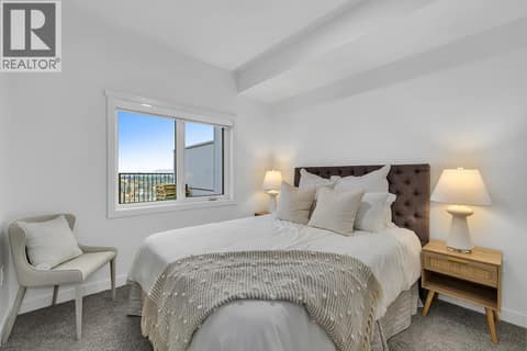 Second Bedroom. Photos may be of a similar home in the community. at 1057 Frost Road Unit# 301, Upper Mission, Kelowna