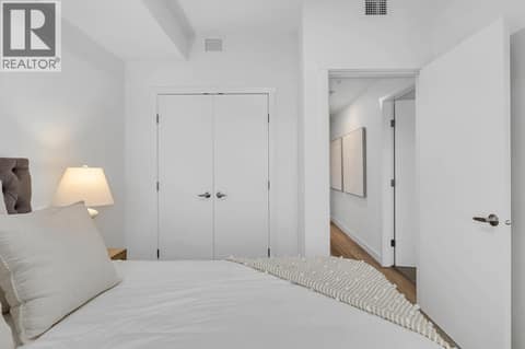 Second Bedroom. Photos may be of a similar home in the community. at 1057 Frost Road Unit# 301, Upper Mission, Kelowna